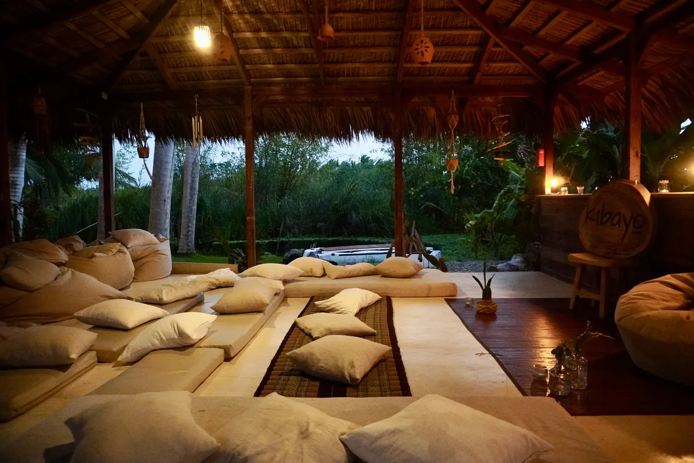 Cushions laid out in the shala at dusk