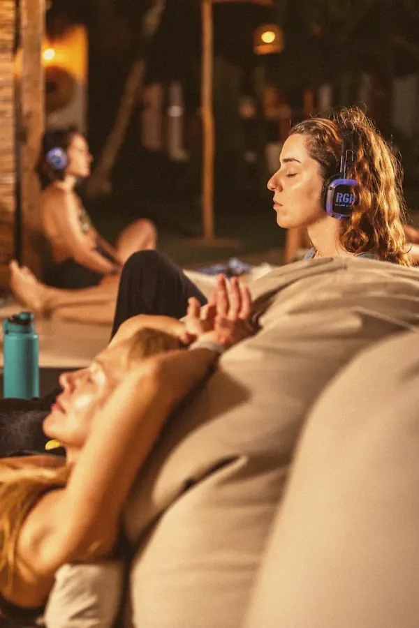A group meditating in the garden